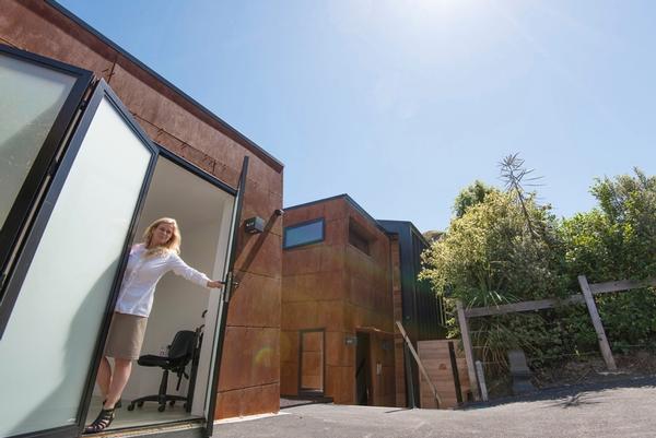 Alice Blackley of Art Adventures at the door of the new GreenBrown Gallery in Frankton, Queenstown.